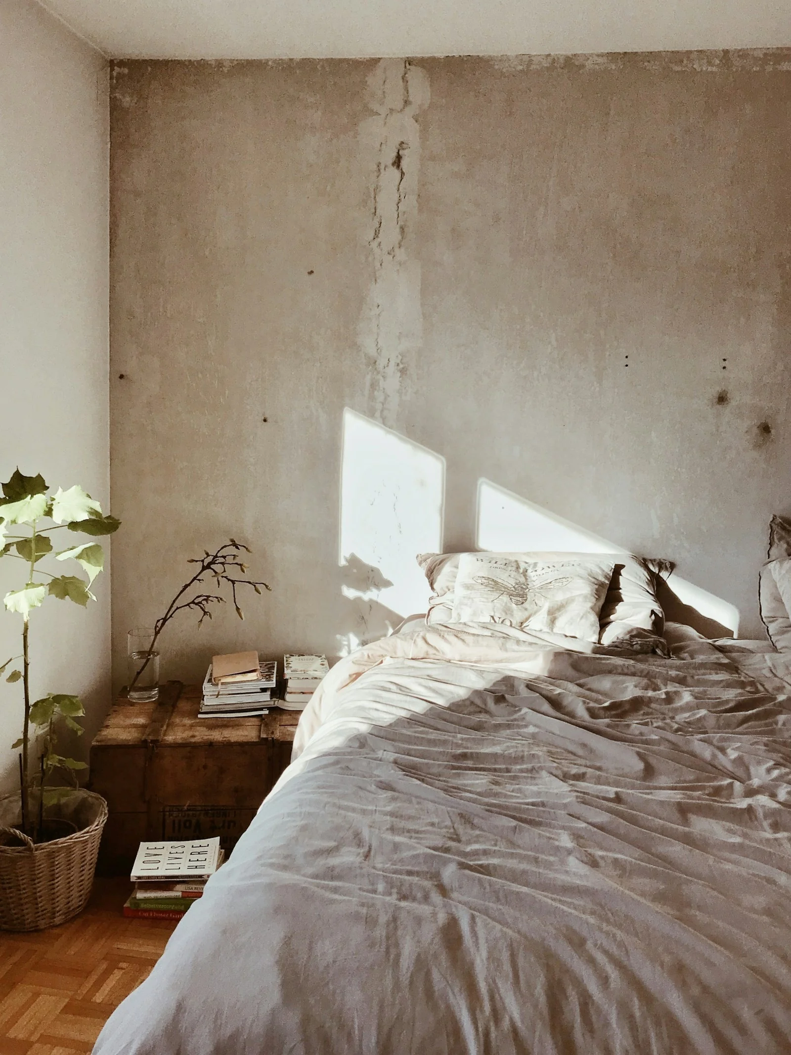 Morning sunlight falling across linen bedding
